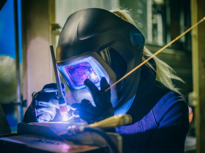 Female welder extreme close up action shot what can i earn as a welder